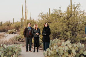 Guests at sabino canyon elopement looking at bride and groom