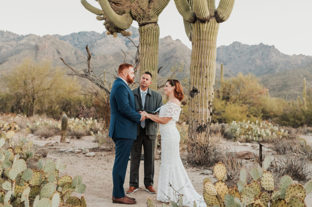 Candid elopement moments under crested saguaro Sabino Canyon Tucson Arizona