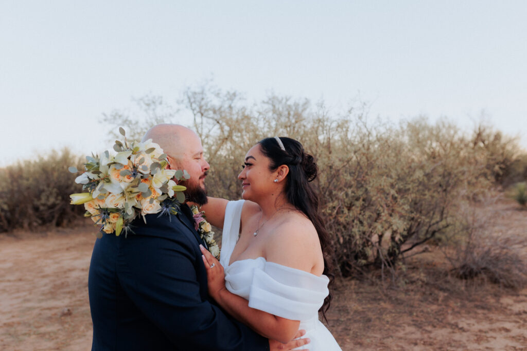 bride and groom pose for portrait