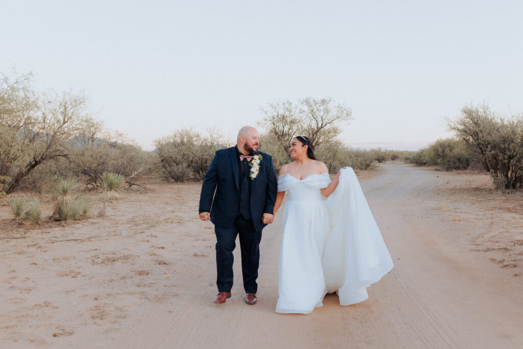 Posed bridal portrait of bride and groom at Rhino Ridge Venue in Willcox Arizona
