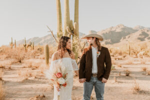 Couple celebrating after their Sabino Canyon elopement