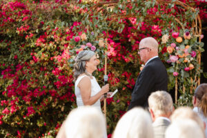 Bride and groom exchanging vows at an Urban Grove wedding