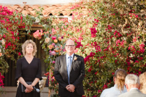 groom waiting for his bride to walk down the aisle