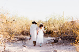 couple walking to tucson micro wedding