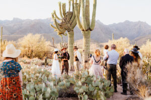 family and friends gather around this tucson micro wedding