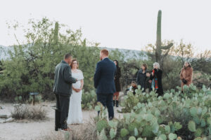 sunrise ceremony at sabino canyon with guests in the background
